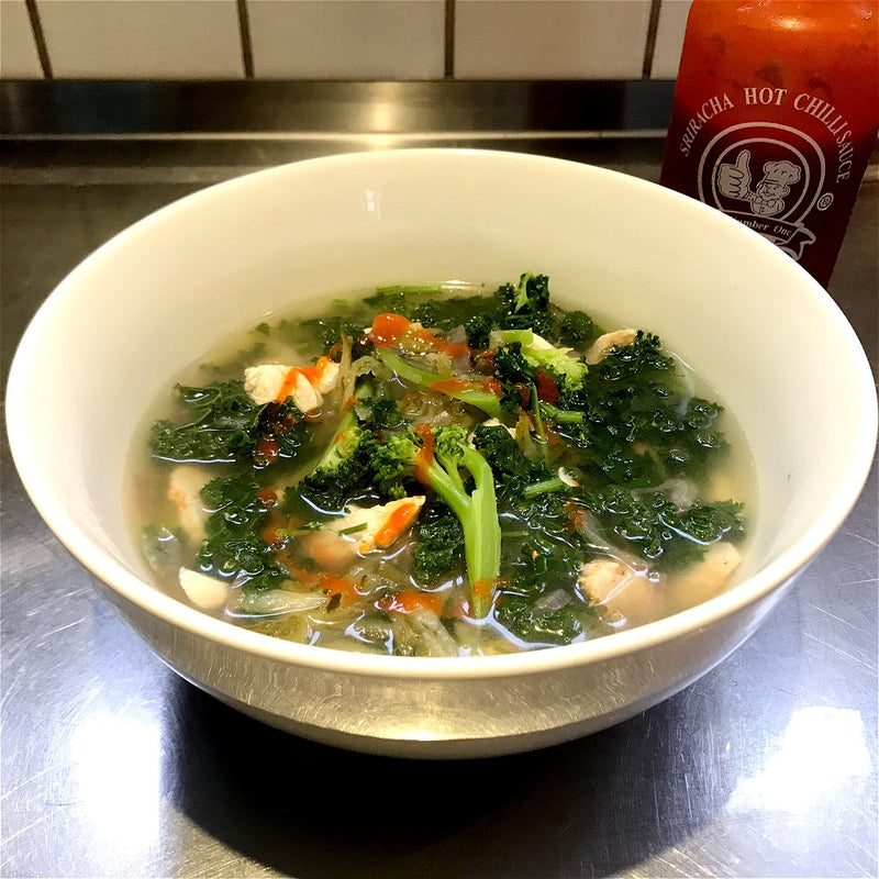 A bowl of broccoli broth, offering a nutritious and flavorful soup featuring the goodness of broccoli.