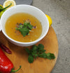 A bowl of chicken broth, offering a comforting and savoury broth made from chicken.