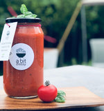 A jar of Roasted Tomato, Capsicum, and Basil Soup, showcasing a savory and aromatic soup perfect for savoring the flavors of roasted tomatoes, capsicum, and basil.