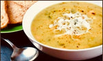 A bowl of Tuscan Cannellini Bean Soup flavored with garlic, lemon, and paprika, offering a delicious and aromatic dish.